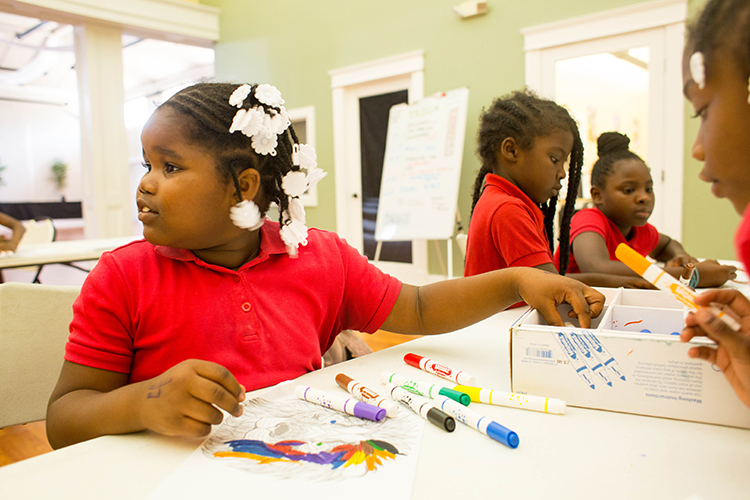 After school students work on therapeutic art at the Tampa Heights Youth Development and Community Center.