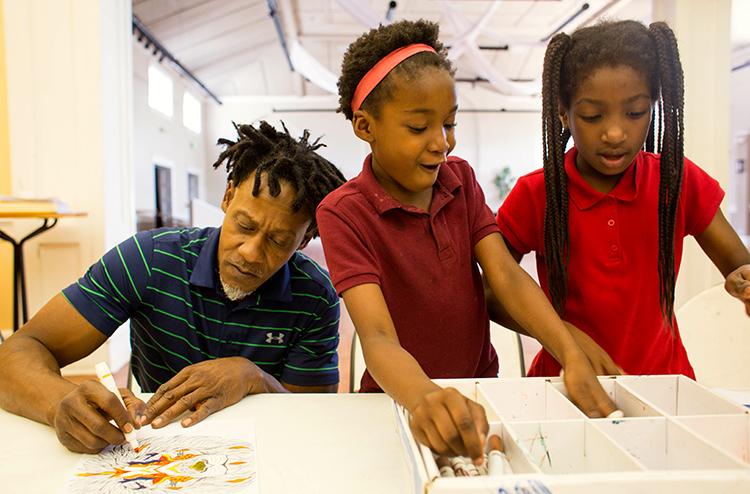 Roddrick Davenport works on therapeutic art with kids at the Tampa Heights Community Center.