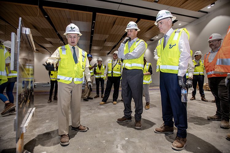 Charles Lockwood, left, dean of USF Morsani College of Medicine, led a tour of the new USF Morsani College of Medicine and Heart Institute, under construction on Channelside Drive.