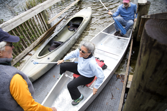 Catherine Valentine lands her canoe after paddling with the Florida Wildlife Corridor team on the Rainbow River. 