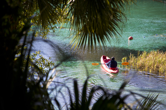 A kayaker warms up on the Rainbow RIver before the Florida Wildlife Corridor Expedition Trail Mixer. 