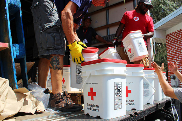 American Red Cross volunteers distribute limited supplies as Hurricane Irma approaches in 2017.