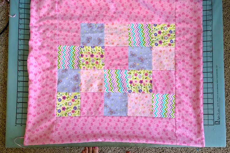 A finished crib quilt.