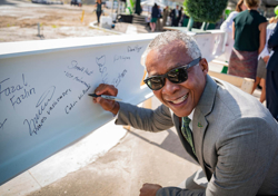 Calvin Williams, vice president for Administrative Services at USF, signs the 20-foot long, 800-pound beam placed on top of the new USF Health Morsani College of Medicine and Heart Institute.