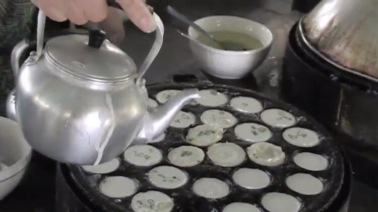 Cooking for weekend crowds at Thai Temple in Tampa.