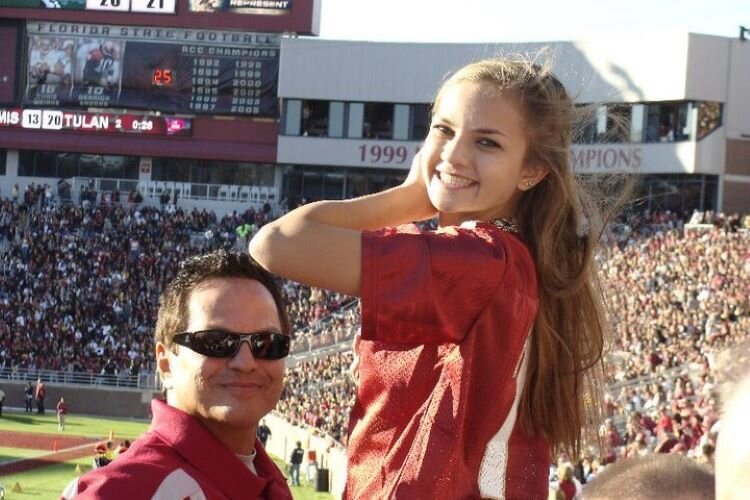 Michael and Christine Ortoll at a Florida State University football game