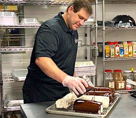 Chef Ronnie Estep prepares dessert at Lynn's Catering.