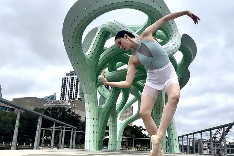 Dancer Annelise Bond performs at Julian B. Lane Riverfront Park in Dance Rising Tampa Bay's first film "Tampa Iconic."