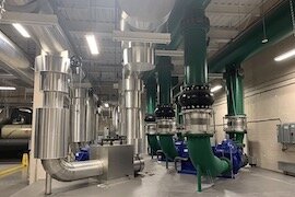 Pipes inside Water Street Tampa's new chiller plant.