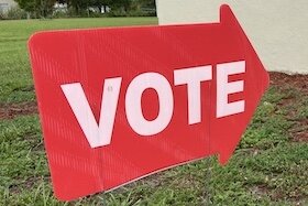 Directional signage as voters enter precinct polling places.