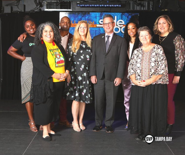 Leaders of the nonprofit organizations from Social Venture Partners Tampa Bay's Fast Pitch program stand with Community Foundation Tampa Bay Senior Vice President Community Impact Jesse Corragio