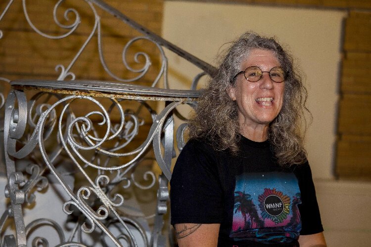 WMNF Community Radio General Manager Randi Zimmerman takes a break outside Ybor City's Cuban Club during Tropical Heatwave.