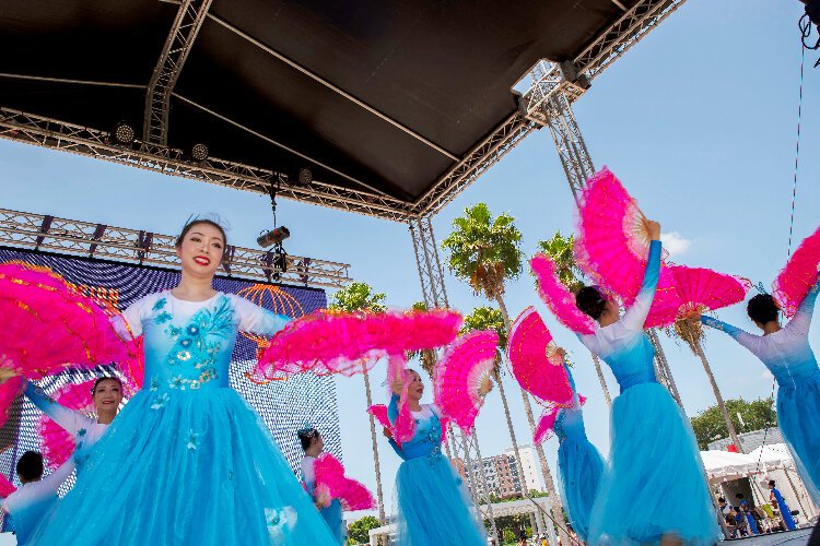 Members of the Chinese-American Association of Tampa Bay (CAAT) perform at the Asian Pacific Islander Cultural Festival at Curtis HIxon Waterfront Park.