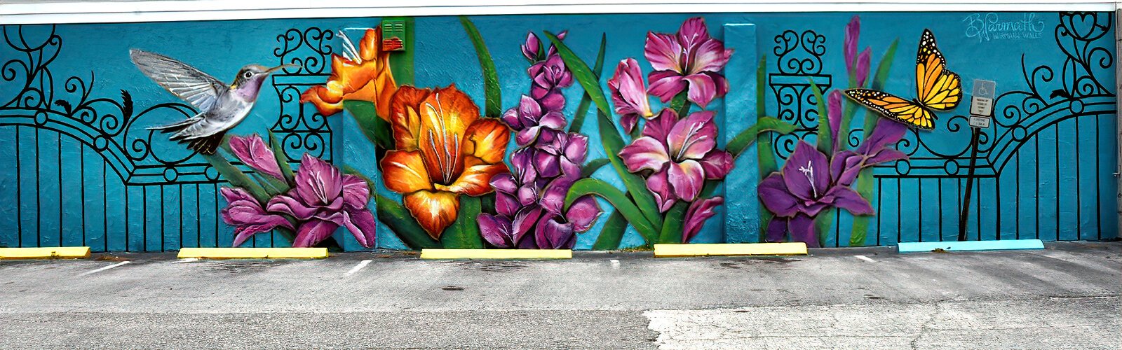 Artist Beth Warmath's mural  “Gladiolus in Bloom” along Cleveland Street is dedicated to the history of Clearwater, where acres of gladioli flowers used to grow.