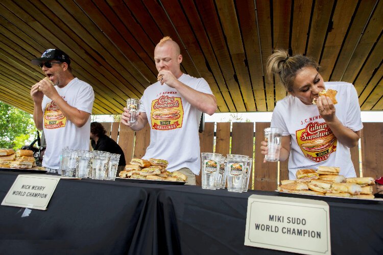 This year's J.C. Newman Cigar Co. Founder's Day celebration included a Cuban sandwich eating contest that pitted the "Power Couple of Competitive Eating," Nick Wehry and Miki Sudo, against one another.