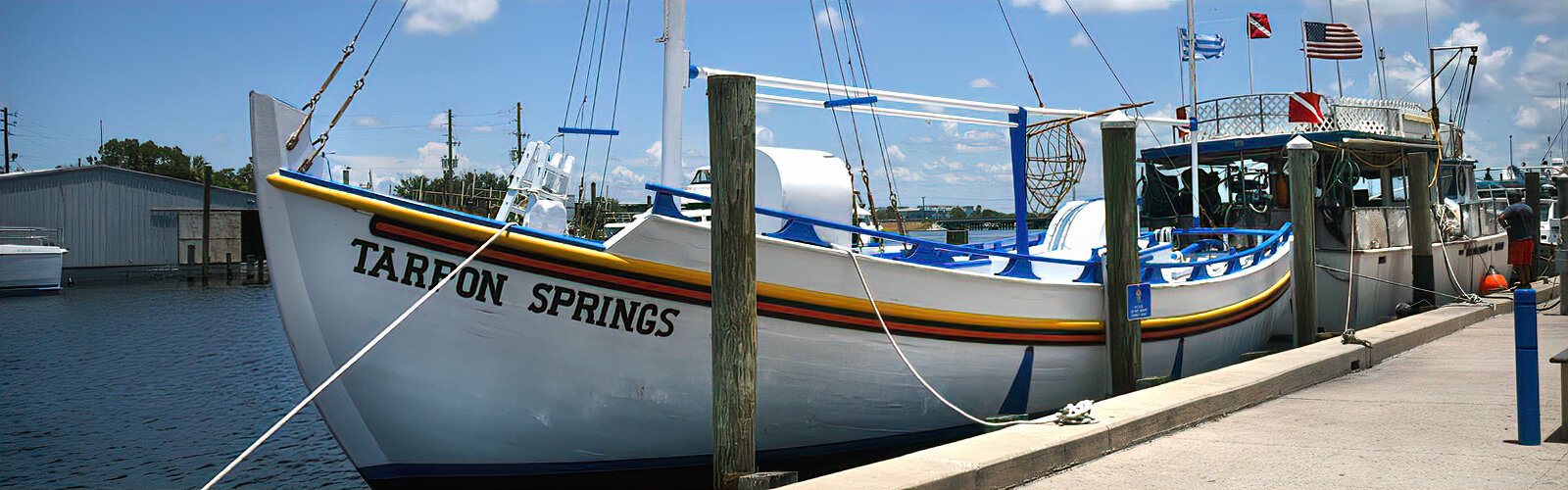 A sponge diving boat built in the style common in the Dodecanese Greek Islands is anchored in Tarpon Springs, which is known as the sponge capital of the world.