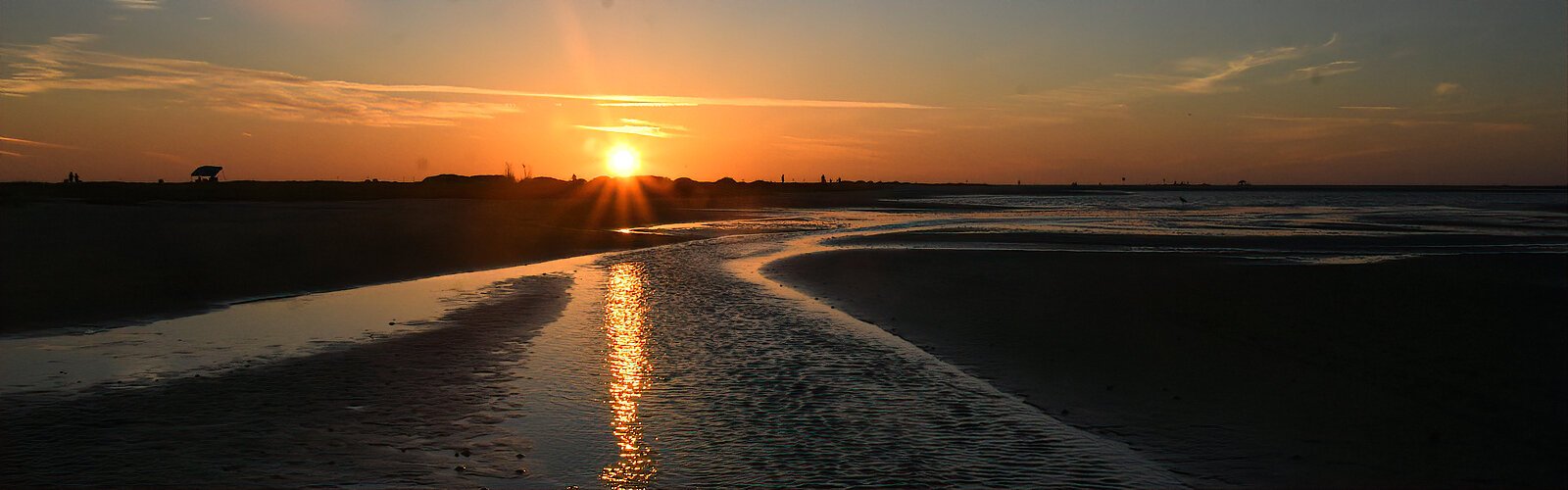 Another wondrous day at Fort De Soto Park ends with a memorable sunset over the lagoon at low tide.