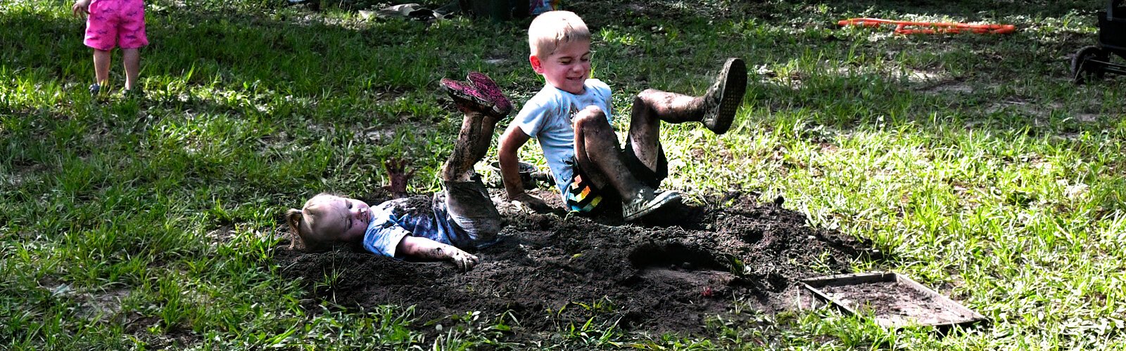 Mud is pure bliss for Amelia, 2, and big brother Zachary, 4, who love the chance to have fun and get dirty.