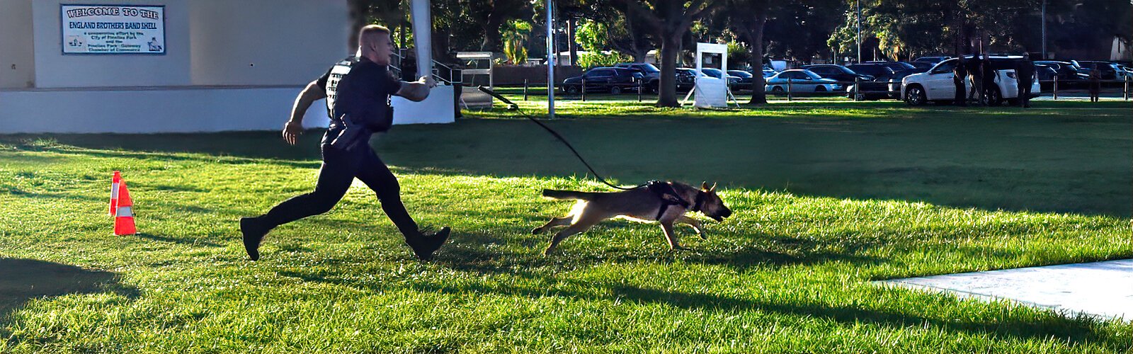 Deputy Jason Whidby demonstrates a chase with his K-9 Gunther, highlighting the skills received during training.