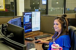 A new partnership program places Crisis Center of Tampa Bay mental health specialists in the Tampa Police Department 911 dispatch center. 