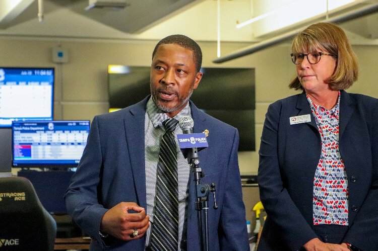 Tampa Police Deputy Chief Calvin Johnson and Crisis Center of Tampa Bay President and CEO Clara Reynolds during a Tuesday, July 23rd press conference on their new partnership program.