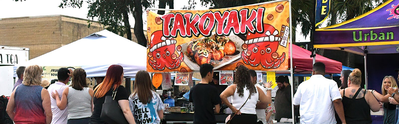 Asian street food vendors such as Japanese Takoyaki participate in the Asian Mega Night Street Food Market Summer and Music Fest in St. Pete’s Warehouse Arts District.