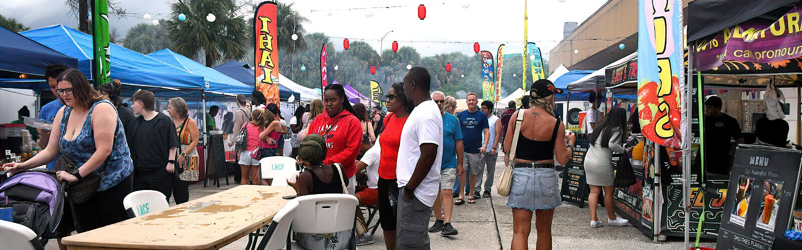 Tons of delicious eats from Asian vendors attract a big crowd despite uncertain weather.