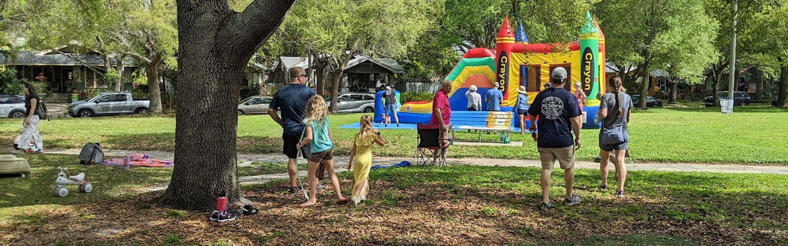  A bounce house installed in Seminole Park for Founders Day activities attracts little and big kids.