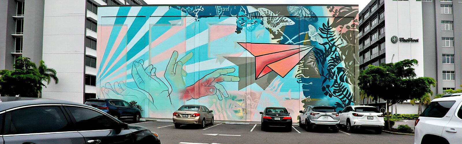 Adorning a wall in the Westshore City Center, the mural “Paper Plane” by the creative team Illsol represents new ideas, change and progress.