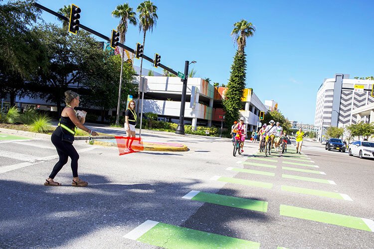 A group makes its way through downtown during Tampa's World Car-Free Day.