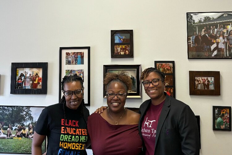 The Kitchen Table Literary Arts team: Community Outreach Director and Workshop Instructor Tiffiany "Slam" Anderson, Financial Director Jasmine Smith and Executive Director Sheree L. Greer