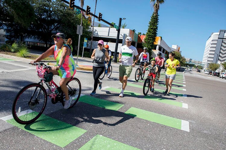 Participants bike and jog the streets of downtown during the 2nd annual Tampa World Car-Free Day