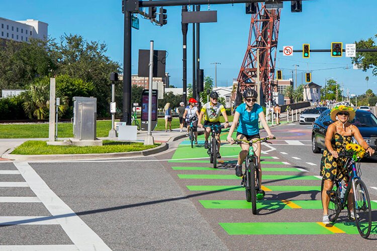 Riders in Tampa's World Car-Free Day roll across Ashley Drive en route to the Encore district downtown, one of the event’s three activity hubs along with Midtown Commons and HCC Ybor Plaza.