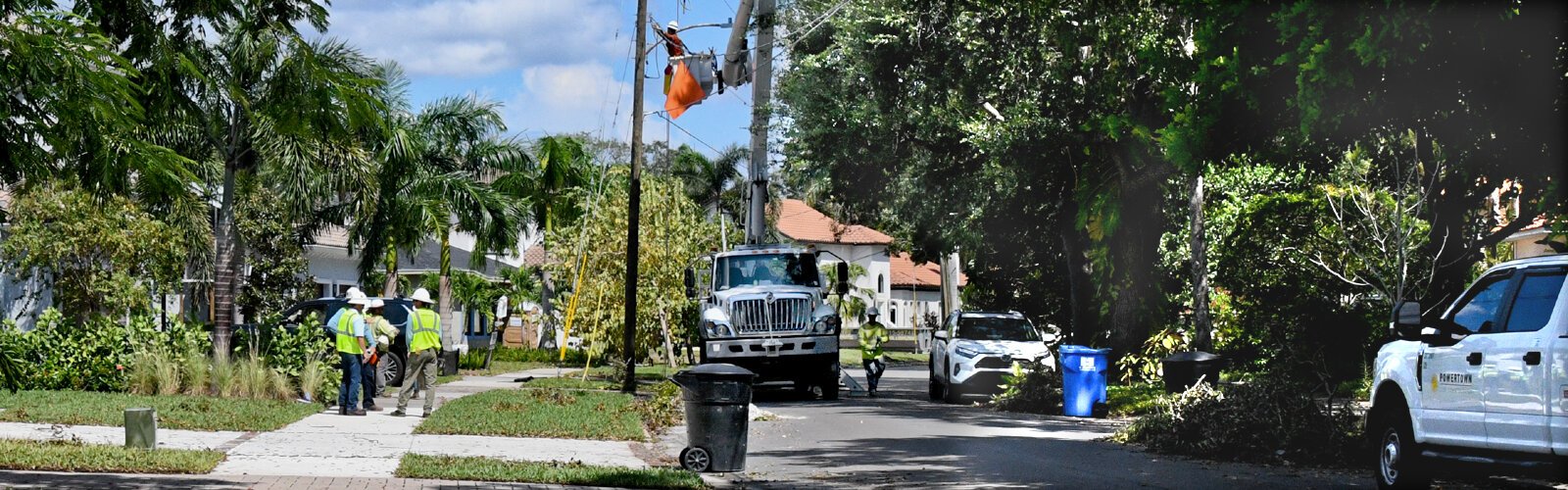 A TECO team works on power lines in the Snell Isle neighborhood in the aftermath of Hurricane Helene.