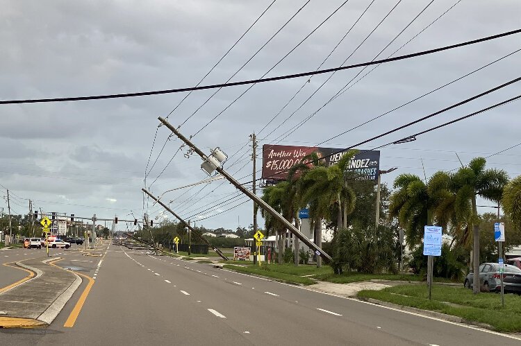 Downed power poles along Park Boulevard in Pinellas Park