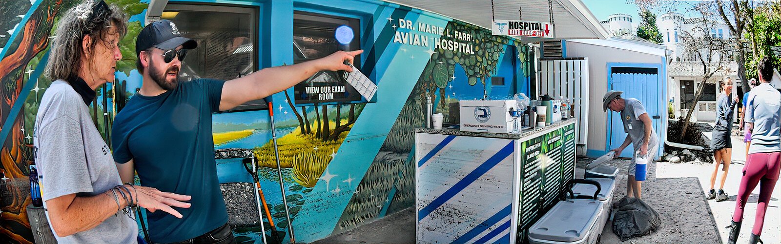 As staff directs volunteers flooding watermarks are visible on the mural and front counter of the Seaside Seabird Sanctuary’s avian hospital, which was forced to shut down all rescue operations.