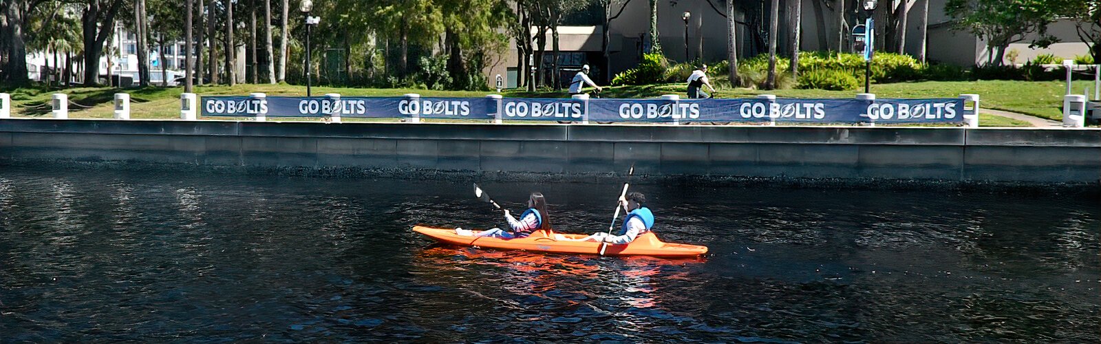  Paddling by the Straz Center for the Performing Arts, two kayakers enjoy the balmy weather on the Hillsborough River.