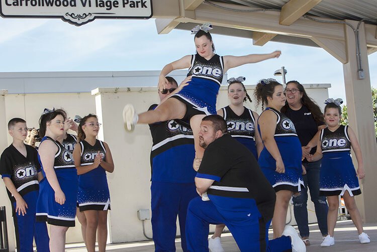 Members of the "One Dream" team from One Elite All-Star Cheerleading perform at Saturday's F.R.I.E.N.D.S. eighth annual Buddy Walk.