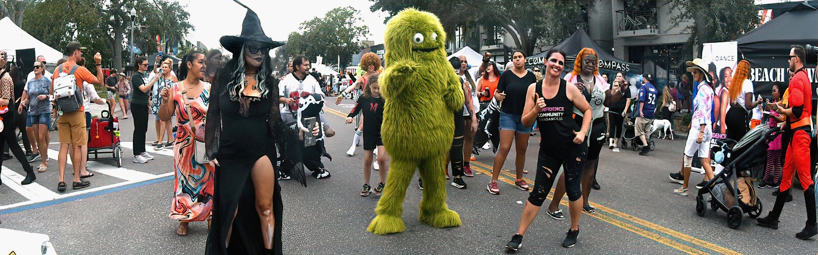 Following the footsteps of St Pete/Clearwater DivaDance team, festival goers celebrate Halloween on Central.