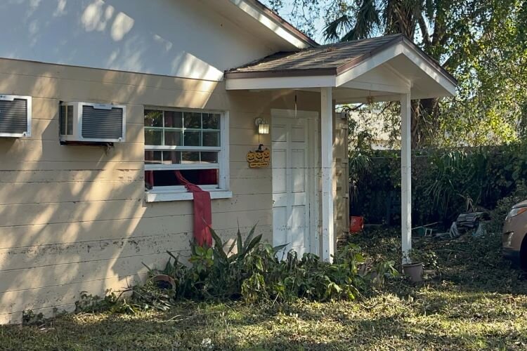 As Milton's floodwaters rose, Yanin Ledesma and her son Gregory Ashwood climbed out a window to escape their duplex apartment in North Tampa's University Area neighborhood