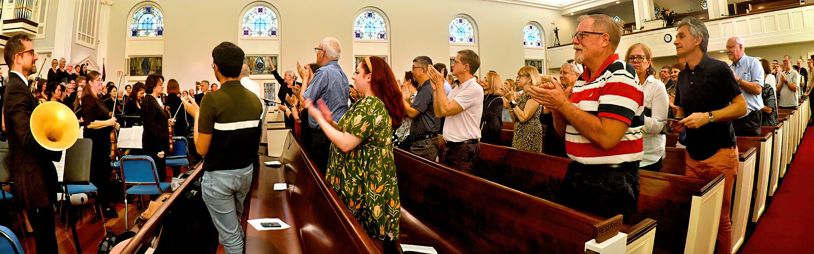 The Tampa Oratorio Singers receive a standing ovation from the audience at the Palma Ceia Presbyterian Church.