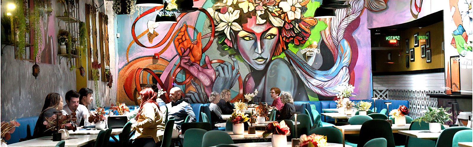 The breathtaking mural of Tampa-based artist Carlos Pons makes dining at Ybor’s 7th + Grove restaurant a complete art immersion experience.