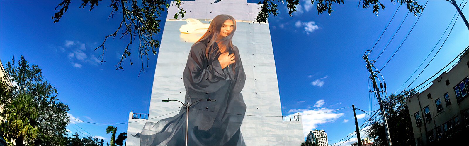 Canadian artist Emmanuel Jarus’ creation for the 10th anniversary SHINE St Peterburg Mural Festival spans the entire 14-story Walker-Whitney building,making it the city’s largest-ever mural.