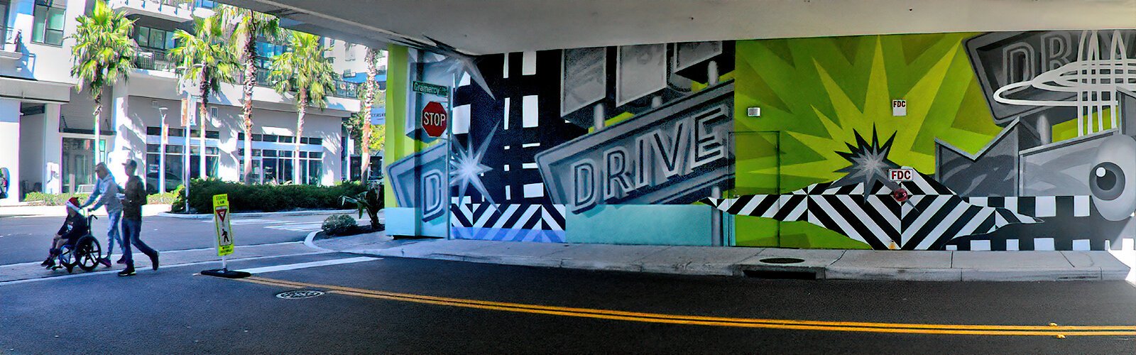 Los Angeles-based artist Trav MSK left his mark at Midtown Tampa with his mural “Immersion” on Bromley Grand Avenue.