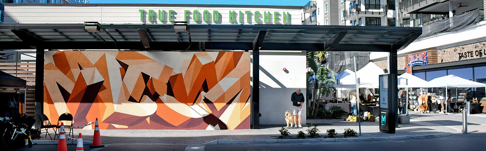 Known for his bold text-based murals, artist Ben Johnston made a splash at Midtown Tampa with his oversized, bold letters spelling out “MIDTOWN.”