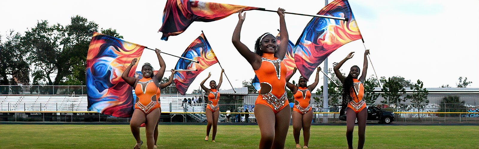  Stranahan High School band majorettes spin flags at the MLK Battle of the Bands.