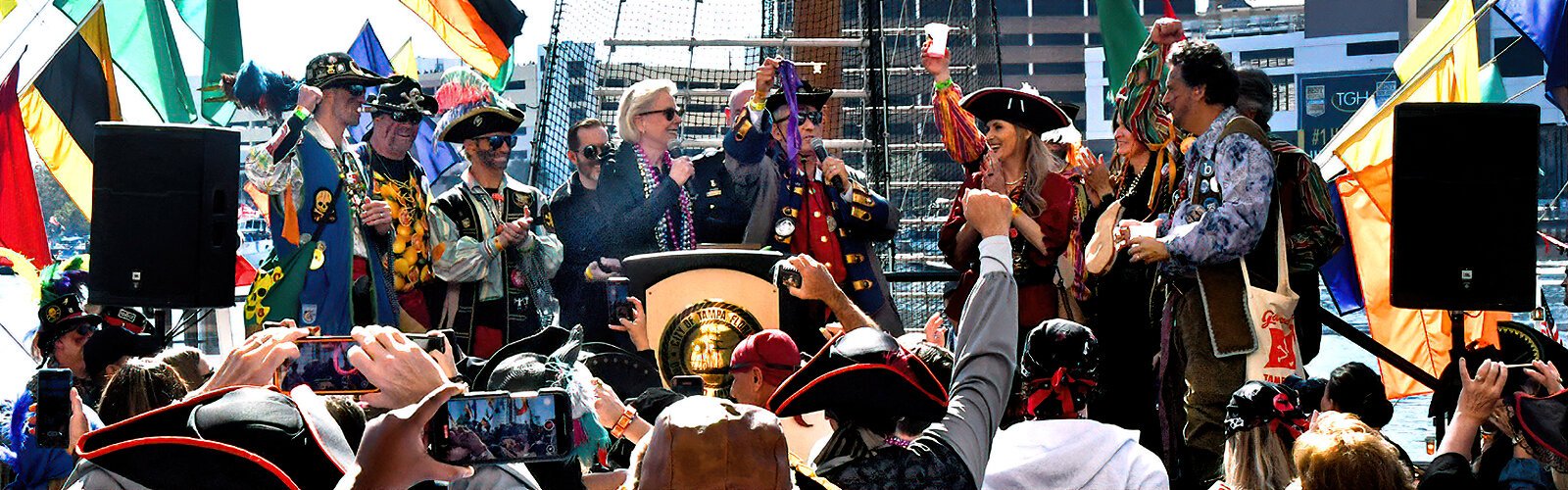  Tampa Mayor Jane Castor hands over the key of the city for a day to Ye Mystic Krewe of Gasparilla’s Captain Drew Pittman, kicking off the festivities of the Gasparilla Festival.