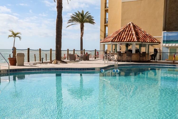 The swimming pool and tiki bar at the Holiday Inn Hotel & Suites Clearwater Beach are open as the hotel finishes its final hurricane renovations and repairs and looks ahead to the spring tourism season 