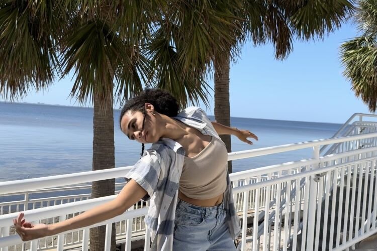 Dancer and choreographer Talia Demps at Ben T. Davis Beach in "Tampa Iconic."