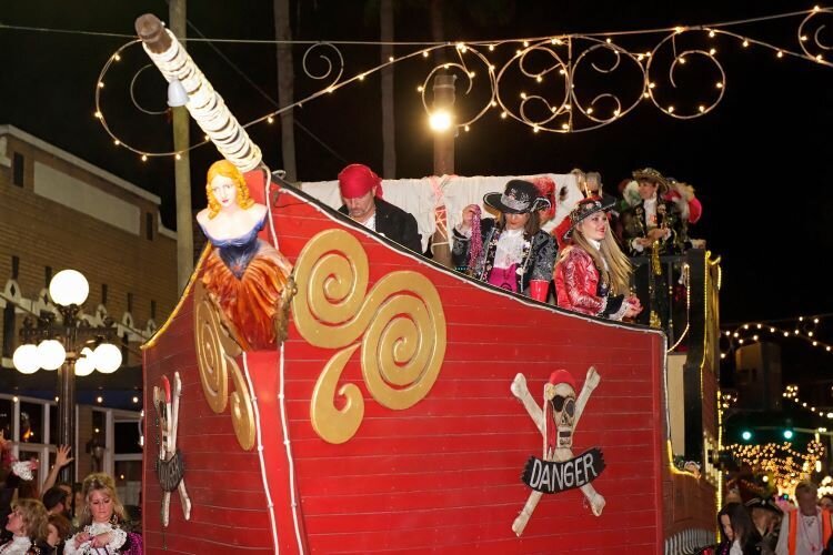 The Illuminated Knight Parade features more than 70 ornately decorated floats.